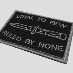 a black and white patch with the words, loyal to few killed by none on it