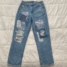 American Eagle Patched Mom Straight Jean. Size 4 Regular. Blue. Excellent Condition, Never Worn. See Pictures. Size And Materials Tag Included. Length Approx. 37 Inches. Waist Approx. 28 Inches. See Pictures. Thank You For Shopping My Closet Item #08 Patches Under Ripped Jeans, Western Clothes, Jeans American Eagle, Patched Jeans, American Eagle Outfitters Jeans, Western Outfits, Straight Jeans, American Eagle Outfitters, American Eagle