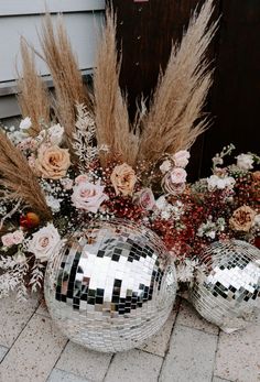 Disco balls placed among pink and red flowers along with pampas grass during a winter wedding in Florida Watercolor Inn And Resort, Hindu Wedding Decorations, Santa Rosa Beach Florida, Rusting Wedding, Wedding Maids, Romantic Beach Wedding, Bridal Theme, Brewery Wedding, January Wedding