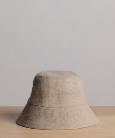 Linen Bucket Hat Natural Inspired by fisherman styles, our elevated take on the classic bucket hat is the summer’s definitive beach bag essential. 100% linen. Made in Portugal. | Jenni Kayne Women's Linen Bucket Hat Size Small/Medium Beach Bag Essentials, Jenni Kayne, Essential Bag, Linen Women, Hat Sizes, Get Dressed, Beach Bag, Bucket Hat, Nature Inspiration