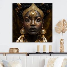 a woman's face with gold jewelry and earrings on it in a living room