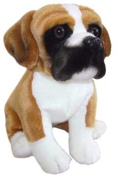 a brown and white dog stuffed animal sitting on top of a white floor next to a wall