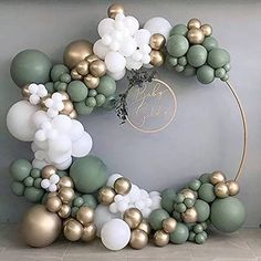 a wreath made out of balloons and balls