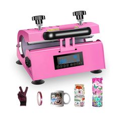 a pink machine with two coffee mugs on it and some other items around it