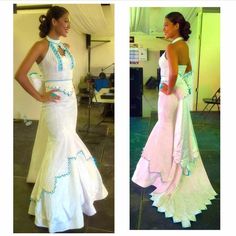 two women in dresses standing next to each other on a dance floor and one is wearing a white dress with blue trim