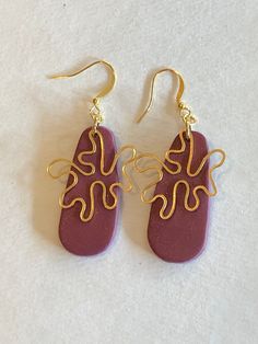 These earrings are part of the splat collection! They are a beautiful purple color with brass splat accents attached. They are super lightweight and comfortable to wear.  I use various materials for my jewelry, such as wood, polymer clay, acrylic paint, and brass. Please handle all jewelry with care.  Disclaimers: - Polymer clay is delicate. If dropped or bent, it may break.  - Wood jewelry will always have a unique grain and color transition.  - Please note that each piece is handmade by me so please allow for any imperfections or color variations.  Feel free to message me with any questions or issues!! Instagram: @CosmoHandmadeDesigns Thank you so much for stopping by my shop!! Artsy Purple Dangle Earrings, Wood Polymer Clay, Painted Polymer Clay, Color Transition, Polymer Clay Jewellery, Clay Jewellery, Wood Jewelry, Wood Jewellery, Polymer Clay Jewelry