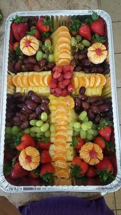 a platter filled with lots of different types of fruit