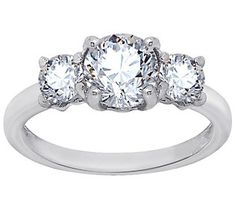 Give this ring an audition. With a triple threat of cubic zirconia Diamonique simulated diamonds and no shortage of sparkle, this ring's performance is a knockout (and demands the spotlight every time). 3 Stone Rings, Triple Threat, Ring Size Guide, Stone Rings, Prong Setting, Cubic Zirconia, Ring Designs, Sparkle, Ring Size