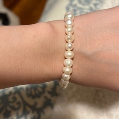 Good Condition And Shape No Stains Or Rips One Size Classic Adjustable Hypoallergenic Pearl Bracelet, Classic Adjustable Pearl White Beaded Bracelets, White Hypoallergenic Pearl Bracelet, Classic Adjustable Hypoallergenic Stretch Bracelet, White Jubilee Stretch Bracelet, Classic White Stretch Bracelet For Everyday, White Classic Adjustable Stretch Bracelet, White Adjustable Classic Stretch Bracelet, Everyday Round Stretch Bracelet