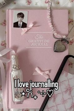 i love journal and perfume bottle with the caption'i love journal'on it