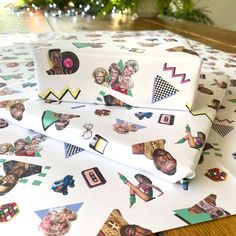 two wrapping sheets with pictures of people on them