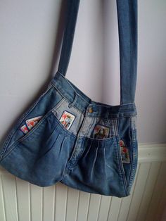 "80's shoulder bag made from a pair of denim jeans, with playing card detail at all pocketed areas. In total their are 6 pockets 2 in the back and 4 in the front of the bag. There is a 12 inch zippered closure at the top of the purse, and a strap that measures 44 1/2\" long, making it suitable to cross over the body, Measurement at the bottom of the bag is 17\", at the top 12 1/2\" , it is 13\" long on each side, center length is 11\" Feel free to convo with me for any further questions. Thank y Salty Dog, Body Measurement, Leather Coin Purse, Old Clothes, Playing Card, Coin Purses, Denim Fabric, Leather Accessories, Leather Purses