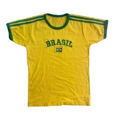 ❤️ Brasil y2k baby tee top embroidery football T-shirt crop top vintage style retro shirt sleeve 📏Recommended sizing:  Size S (UK 6/8)  Size M (UK 10)  Size L (UK 12) Cheap Vintage Tops For Outdoor, 90s Sports T-shirt For Summer, Summer Sports Tops With Team Spirit Style, Retro Tops For Football Season Streetwear, 90s Summer Sports T-shirt, Retro Tops For Streetwear During Football Season, Yellow Crew Neck Top For Sports Season, Summer Sports Tops With Three Stripes, Y2k Short Sleeve Tops For Sports