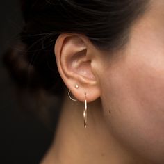 A single stud for your left or right ear. This smart and simple stud takes inspiration from the back of a nose ring, eliminating the need for a backing. Perfect for every day wear, also works perfectly for the often forgotten second and third holes. Sold as singles.See Details for item specifics (carat weight, metal, etc). Classic Everyday Hypoallergenic Ear Climbers, Minimalist 14k Gold Single Ear Climber, Minimalist Hypoallergenic Yellow Gold Ear Climbers, Classic Everyday Hypoallergenic Cartilage Earrings, Modern Internally Threaded Hoop Earrings For Everyday Wear, Classic Everyday Ear Climbers With Matching Earrings, Simple Internally Threaded Piercings For Everyday, Rose Gold Round Cartilage Earrings For Everyday, Simple Internally Threaded Jewelry For Everyday