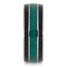 This rugged malachite ring is an excellent conversation piece! Polished tungsten surrounds the exotic inlays of crushed dinosaur bone and vivid malachite. These exotic and colorful inlays are separated by crisp titanium pinstripes. Add a splash of color to your style with this vibrant fossil ring! RING LAYOUTRing Width: 8 mmRing Sleeve: TungstenRing Profile: RoundRing Finish: Polished 0.5 mm Tungsten1.5 mm Crushed Dinosaur Bone0.5 mm Titanium3 mm Crushed Malachite0.5 mm Titanium1.5 mm Crushed Di Fossil Ring, Malachite Ring, Mens Wedding Bands Tungsten, Tungsten Wedding Band, Engraving Fonts, Malachite Rings, Bone Jewelry, Dinosaur Bones, Green Malachite