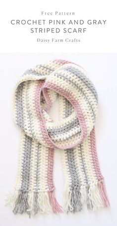 a crocheted scarf with fringes on the ends and two colors of yarn