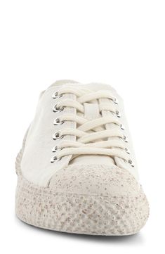 A natural cork and latex midsole ensures optimal comfort in this lightweight sneaker set on an undulate platform sole. 1 1/4" platform Lace-up style Textile upper/synthetic lining and sole Made in Portugal Lightweight Sneakers, Fly London, Up Styles, Recycled Cotton, Womens Sneakers, Cork, Portugal, Nordstrom, Lace Up