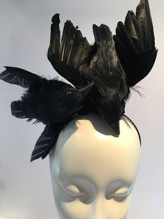 "Black Bird fascinator -Crow- The Birds- Halloween- Feather Headband -Derby- Ravens- goth- Steampunk- Mad Hatter Hello, I have one made so it can ship within a day or two. This fascinator is perfect to add whimsy and is just so fun you'll be the life of the party. A great conversation piece Wear this with a 1960's tweed suit and your \"the Birds\"! This black feather fascinator has 2 black feather bird... I call them Alfred and Tippy. It has great movement. It not a real bird, its styrofoam cove Adjustable Black Feathered Headpiece, Adjustable Black Feather Headpiece, Punk Black Mini Hat For Cosplay, Punk Style Black Mini Hat For Cosplay, Adjustable Black Fantasy Costume Hats And Headpieces, Alternative Black Costume Accessories For Party, Adjustable Punk Headpieces For Costumes, Halloween Fantasy Costume Accessories With Feathers, Black Adjustable Punk Mini Hat