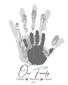 a hand print with the words our family daddy and mommy in black on a white background