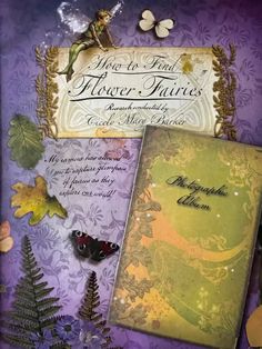 an altered book with flowers and butterflies on the cover is shown in purple, yellow and green