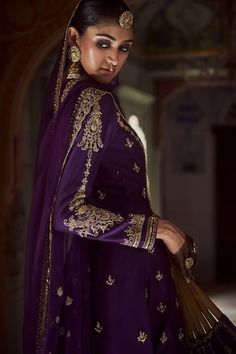 Purple high low jacket with dori, aari, zardozi, sequin, cutdana, bead embroidery in floral pattern. Paired with embellished lehenga and dupatta. - Aza Fashions Long Sleeve Purple Choli With Pallu, Purple Long Sleeve Choli With Pallu, Long Sleeve Outerwear With Pallu For Weddings, Ceremonial Choli With Dupatta, Ceremonial Anarkali Salwar Kameez, Ceremonial Anarkali Traditional Wear With Long Sleeves, Ceremonial Long Sleeve Anarkali Traditional Wear, Elegant Long Sleeve Purple Lehenga, Ceremonial Cutdana Salwar Kameez