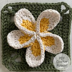 a crocheted square with a flower in the middle on top and text overlay that says,'free crochet pattern '