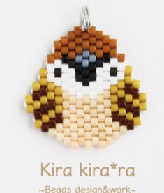 the bead pattern is designed to look like a bird with brown, yellow and white feathers