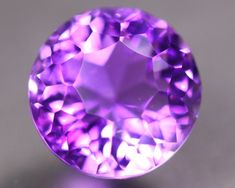 an amethyst purple diamond is shown in this image