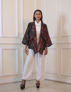 Indonesian authentic handmade tenun (woven) outer made with authentic batik fabric from Jepara, Central Java, Indonesia.  Fit and Sizing: Female model is 160 cm. One size fits all. Chest: 45 inch (114 cm) Length: 25 inch (63.5 cm) Sleeve length: 19 inch (48 cm) Details: 3/4 length sleeves. Two front pockets. Batik origin: Central Java, Indonesia Fit: Run Small,  see size chart for detail. Material: Cotton Care Instructions: we recommend hand washing and line/air drying to preserve color and shape. **Free domestic shipping to all 50 US states** Check out our social media accounts: Instagram: @davas_batik Facebook: Davas Batik Pinterest: Davas Batik Cardigan Batik, Model Outer Batik, Batik Jumputan, Outer Batik, Outer Women, Central Java, Female Model, Batik Fabric, Hand Washing