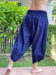 "Male Model Tall 5'9\" Waist 34\" Mens Japanese Samurai Style Japanese Casual, Harem Baggy Hakama cotton Pants Samurai Pants - elastic waistband Fits all! Unisex pants These beautiful casual pants is unique & comfortable to wear Handmade with a very lovely pattern, it is easy to wear and great for many occasions. One size fits most. These pants are great for many different activities like traveling, dancing, going to festivals, rock climbing, yoga, meditation, massage, working out, martial a Blue Harem Pants With Elastic Waistband, Tapered Leg, Blue Tapered Leg Harem Pants With Elastic Waistband, Blue Harem Pants For Yoga, Traditional Ankle-length Bottoms With Elastic Waistband, Traditional Harem Pants For Meditation, Traditional Wide Leg Harem Pants For Meditation, Blue Relaxed Fit Harem Pants, Blue Harem Pants With Relaxed Fit, Traditional Pants With Elastic Waistband And Relaxed Fit