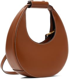 Polished leather shoulder bag in tan. · Press-stud tab at integrated carry handle · Adjustable and detachable crossbody strap · Magnetic press-stud tab closure · Zip pocket at interior · Suede lining · Contrast stitching in off-white · H4.75 x W9 x D3 · Total height: H10.5 Supplier color: Tan Staud Shoulder Bag With Round Handle For Shopping, Staud Bags With Top Carry Handle For Everyday, Staud Leather Shoulder Bag With Round Handle, Staud Leather Bags With Round Handle, Staud Top Handle Bag For Everyday, Staud Shoulder Bag With Round Handle, Staud Shoulder Bag With Round Handle For Everyday Use, Staud Crossbody Shoulder Bag With Top Carry Handle, Staud Bags With Detachable Round Handle