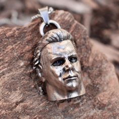 This stunning Michael Myers Halloween Inspired Pendant Necklace is Hand Made by me. Casted In sterling silver, it displays amazing detail and is sure to please anyone who is a fan of the films or villain. it comes with a 18 inch stainless steel chain. It is unisex and can suit anyone and would make an amazing gift! I am a one man show so it may take me some time but I will get these shipped as quickly as possible. As this is a handmade item there may be slight defects or ways it may slightly dif Collectible Vampire Jewelry For Halloween, Gothic Hand-cast Halloween Necklaces, Vintage Engraved Jewelry For Halloween, Silver Pendant Jewelry For Cosplay, Halloween Engraved Metal Necklace, Vintage Sterling Silver Halloween Jewelry, Collectible Metal Jewelry For Halloween, Gothic Movies, Halloween Gothic