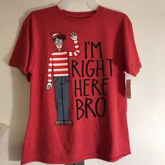 This Is A New Never Used Fun Novelty "Where's Waldo" Tee Shirt For Youth Sizes 8 And 18. Waldo Is Answering The Question By Saying "I'm Right Here Bro" 50% Cotton, 50% Polyester. Tagless Tee. Red Tops With Funny Print And Relaxed Fit, Red Tops With Funny Print In Relaxed Fit, Funny Red Tops With Cartoon Print, Red Shirt With Funny Print And Relaxed Fit, Red Shirt With Funny Print Relaxed Fit, Red Relaxed Fit Shirt With Funny Print, Funny Red Pre-shrunk Tops, Red Pre-shrunk Tops, Red Cartoon Print Graphic Tee