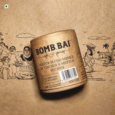 a can of bomb bai on top of a piece of paper with an image of people in the background