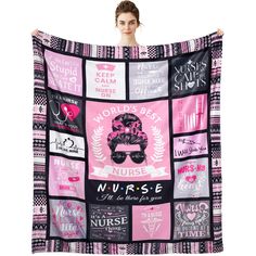 a woman holding up a pink and black blanket with nurse's names on it