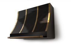 a black and gold striped wall mounted shelf