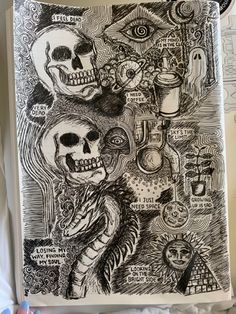 a drawing with skulls and other things on it