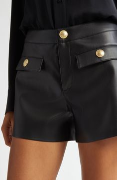 Step up your day-to-night looks with these high-waisted shorts cut from soft faux leather and finished with embossed goldtone buttons. Zip fly with button closure Front button-flap patch pockets 50% polyurethane, 50% polyester Dry clean Imported Luxury Workwear Shorts, Luxury Shorts With Belt Loops, Luxury Short Length Bottoms For Workwear, Luxury Short Length Workwear Bottoms, Luxury Bottoms For Night Out, Workwear Faux Leather Shorts With Belt Loops, Faux Leather Workwear Shorts With Belt Loops, Faux Leather Shorts With Belt Loops For Work, Chic Fall Shorts With Button Closure