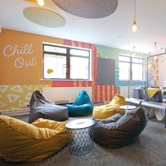 a living room filled with lots of bean bags