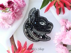 Amazing decoration black cat brooch handmade. A embroidered brooch is an unusual gift to her. This bastet is an unbeatable gift to your loved one, girlfriend, friend or children. This halloween brooch is made by hands and my imagination. The cat brooch is very beautiful and elegant. This gothic brooch is perfect for coat and other clothes. Used high-quality materials (Czech and Japanese beads). Along the edge, the gothic brooch is trimmed with seed beads. Used a Japanese base for the brooch. The back of this occult jewelry is made of high quality leather. This beaded brooch is in stock and ready to travel to its owner. *NOTE: As a gift from my store, this brooch will be packed in a gift box made of designer cardboard *NOTE: Colors may look a little different depending on your monitor setti Gothic Brooch, Bead Embroidery Brooch, Halloween Brooch, Occult Jewelry, Witchcraft Jewelry, Embroidery Brooch, Embroidered Brooch, Jewelry Gothic, Japanese Beads