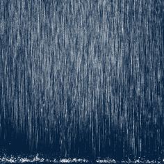 an image of rain falling down on the ground in blue and white color scheme photo