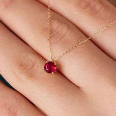 "Our 14k solid gold ruby necklace is a stylish jewel for you and your loved ones with its elegant design. Time to pamper yourself and your loved ones... 🤍🤍 Special gifts for your special moments. We produce our jewelery for you in the most perfect way. 🤍🤍 All of our products are made of 14K Solid gold. FEATURES * Made to order. * Gold Color Selection: Yellow Gold, Rose Gold, White Gold * Gold KT: 14K * Length: 14\", 16\", 18\", 20\", 22\",24\" * Ruby Carat: 0.50 ct. * Pendant Height: 6,00 mm Minimalist Ruby Birthstone Necklace, Yellow Gold Jewelry With Lab-created Ruby For Gift, Red Birthstone Necklace In 14k Gold, Red 14k Gold Birthstone Necklace With Round Pendant, Red 14k Gold Round Pendant Birthstone Necklace, Gift Necklace With Prong Setting And Lab-created Ruby, Ruby Necklace With Prong Setting As Gift, Elegant 14k Gold Birthstone Necklace For Valentine's Day, Gold Ruby Necklace