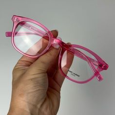 Authentic Saint Laurent Eyeglasses Color: Pink Lens Color: Transparent Shape: Square Product Name: Saint Laurent Sl 588 004 50 Size: 50 Mm Bridge: 22 Mm Temple: 145 Mm Material: Acetate Made In Italy Yves Saint Laurant, Clear Eyeglass Frames, Ysl Sunglasses, Yves Saint Laurent Men, Ysl Saint Laurent, Saint Laurent Accessories, Pink Glasses, Round Eyeglasses Frames, Saint Laurent Sunglasses