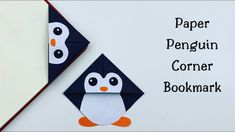 the penguin corner bookmark is next to an origami penguin