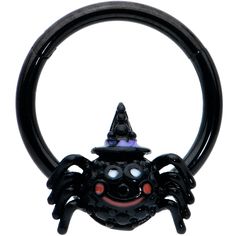 Product Details16 Gauge 3/8 Black Halloween Smiling Spider Witch Hinged Segment Ring The spider on this 16 gauge septum ring is sure to cast a spell on you! It's made with a 10mm black PVD over 316L surgical grade stainless steel hinged circular ring. It features a witchy spider charm, complete with a purple embellished pointy hat, and a sweet smiling expression. It also features a non-removable, hinged segment that makes insertion and removal a breeze and you can rock it in multiple piercings i Punk Black Ring For Halloween, Punk Black Rings For Halloween, Black Punk Rings For Halloween, Halloween Novelty Jewelry For Cosplay, Halloween Cosplay Novelty Jewelry, Black Round Novelty Jewelry, Novelty Black Round Jewelry, Gauge Septum, Smiling Expression