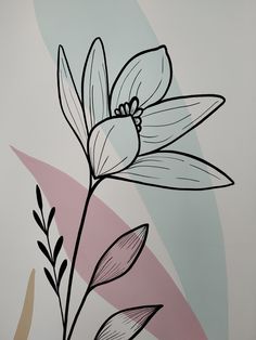 a drawing of a flower on a white wall with pink and blue stripes in the background