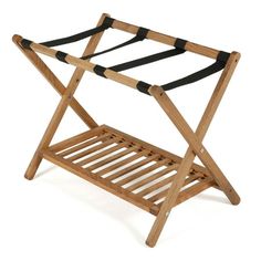 a wooden rack with black straps on it