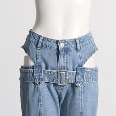 Expertly designed with cut out lateral details and buckle accents, these blue wide leg jeans are a must-have for any fashion-forward individual. The high waist and front closure provide a comfortable and flattering fit, while the back pockets add a touch of practicality.Size Chart（CM）: High Waist Denim Bottoms With Belt, High Waist Blue Flare Jeans With Belt Loops, Trendy Denim Blue Flare Jeans With Belt Loops, Edgy High Waist Denim Blue Flare Jeans, Blue Cutoff Jeans With Belt Loops, High Waist Denim Blue Flare Jeans With Belt Loops, Trendy High Waist Flare Jeans With Belt Loops, Trendy Cutoff Jeans With Belt Loops, Chic Denim Blue Flare Jeans With Belt Loops