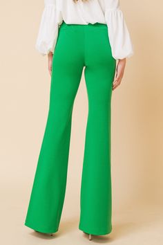 Hight-rise flare pants with center seam. Faux back pockets Details Self: 97% polyester, 3% spandex Imported Size & Fit - Model is 5`8" and wearing size Small - Measurements taken from size Small - Length: 45" Fitted Solid Color Trousers, Solid Stretch Straight Dress Pants, Fitted Straight Pants In Solid Color, Chic Green Full Length Bottoms, Chic Full Length Green Bottoms, Fitted Solid Color Bottoms For Work, Stretch Dress Pants In Solid Color, Fitted Workwear Bottoms In Solid Color, Tailored Full Length Solid Bottoms