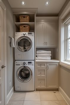 a washer and dryer in a small room